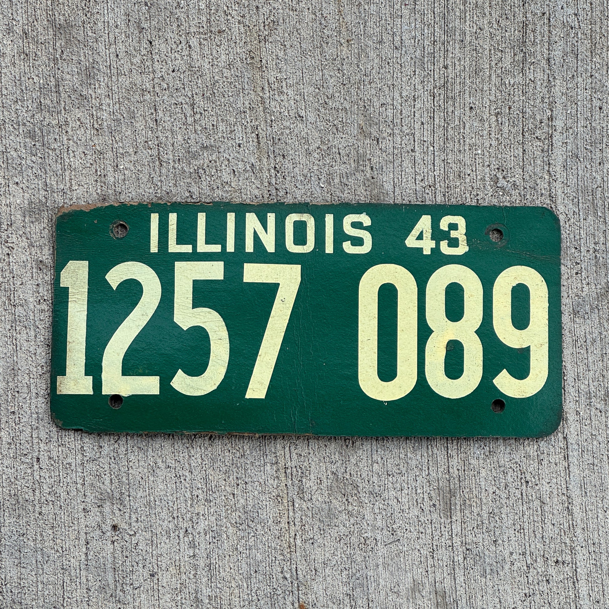 Photo of a 1943 Illinois Fiberboard License Plate Auto Tag Garage Decor Vintage 1 257 089 with original patina