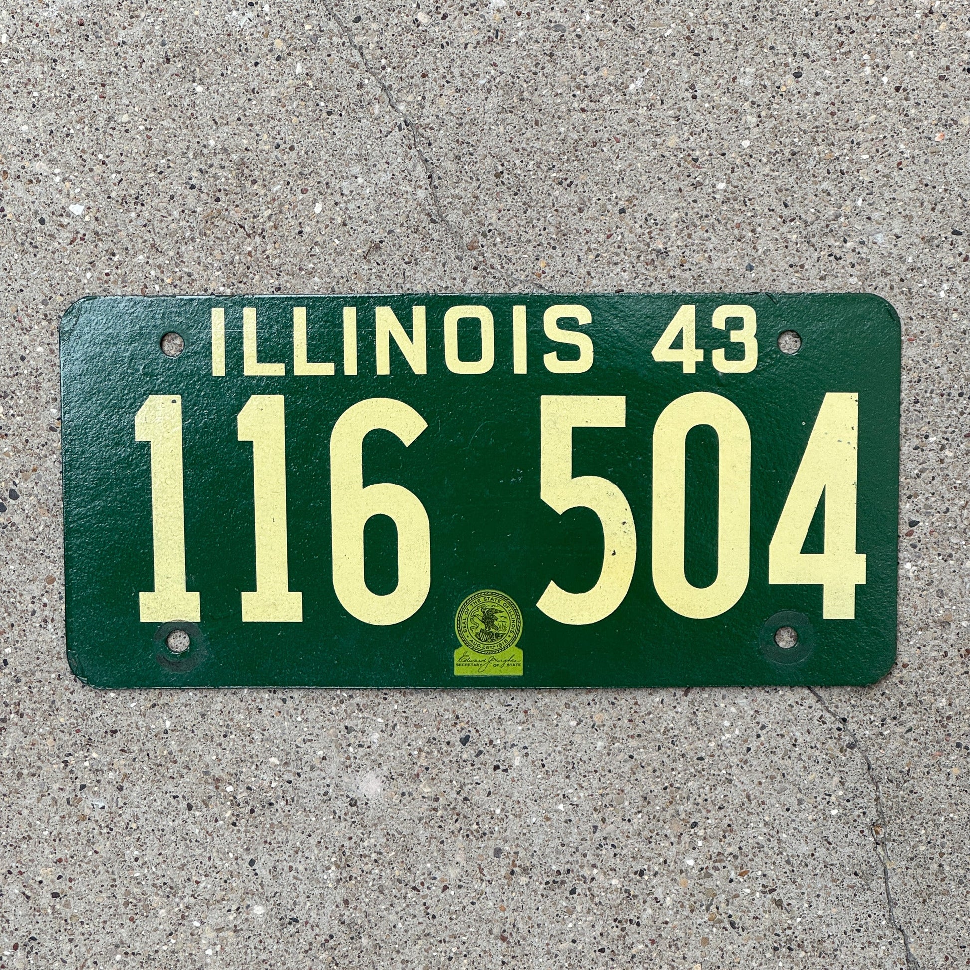 Photo of a 1943 Illinois License Plate Auto Tag Garage Decor Vintage Fiberboard State Seal 116 504 with original patina