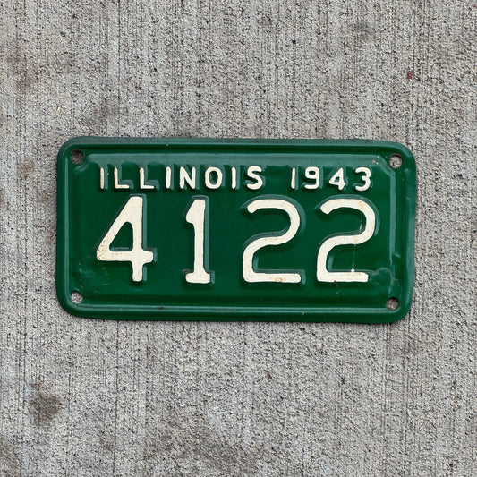 Photo of a 1943 Illinois Motorcycle License Plate Auto Tag Garage Decor Vintage Low Number Four Digit 4122 with original patina