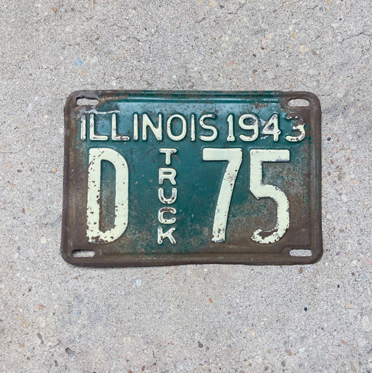 Photo of a 1943 Illinois Truck License Plate Auto Tag Garage Decor Vintage Low Number Two Digit D 75 with original patina