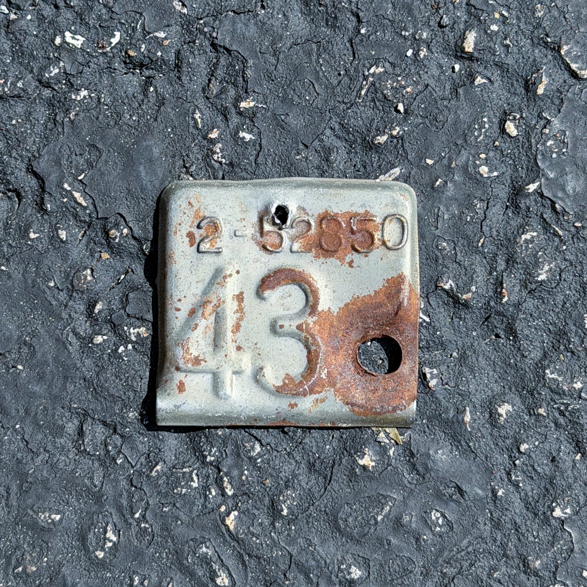 Photo of a 1943 Kansas Tab License Plate Auto Tag Garage Decor Vintage with original patina