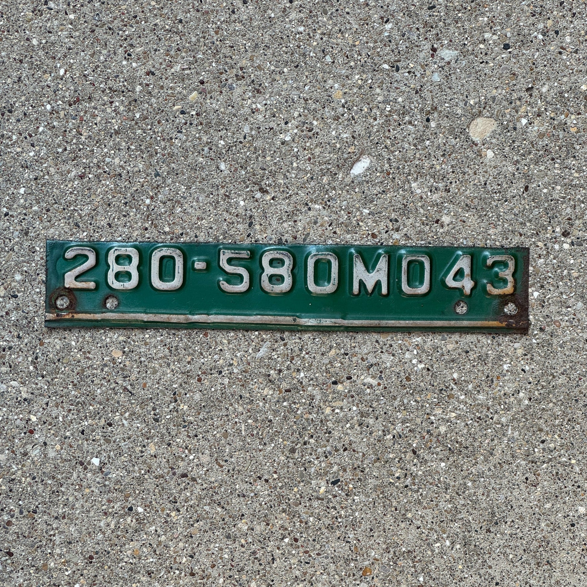 Photo of a 1943 Missouri Tab License Plate Auto Tag Garage Decor Vintage Strip 280 580