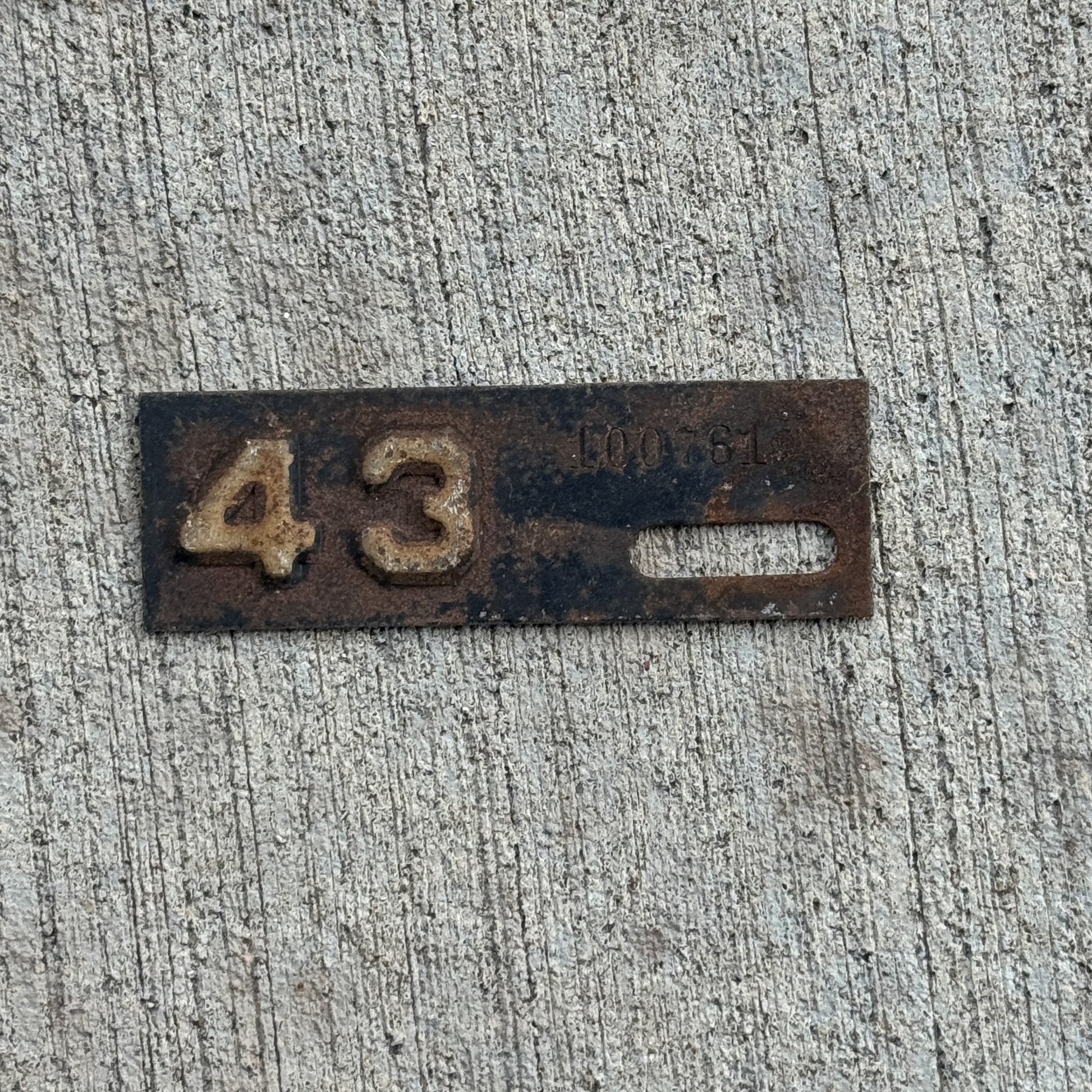 Photo of a 1943 New Jersey Tab License Plate Auto Tag 1 Vintage 100761 with original patina