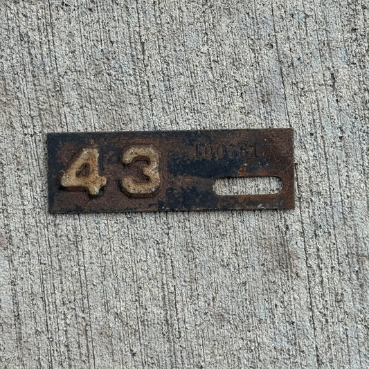 Photo of a 1943 New Jersey Tab License Plate Auto Tag 1 Vintage 100761 with original patina