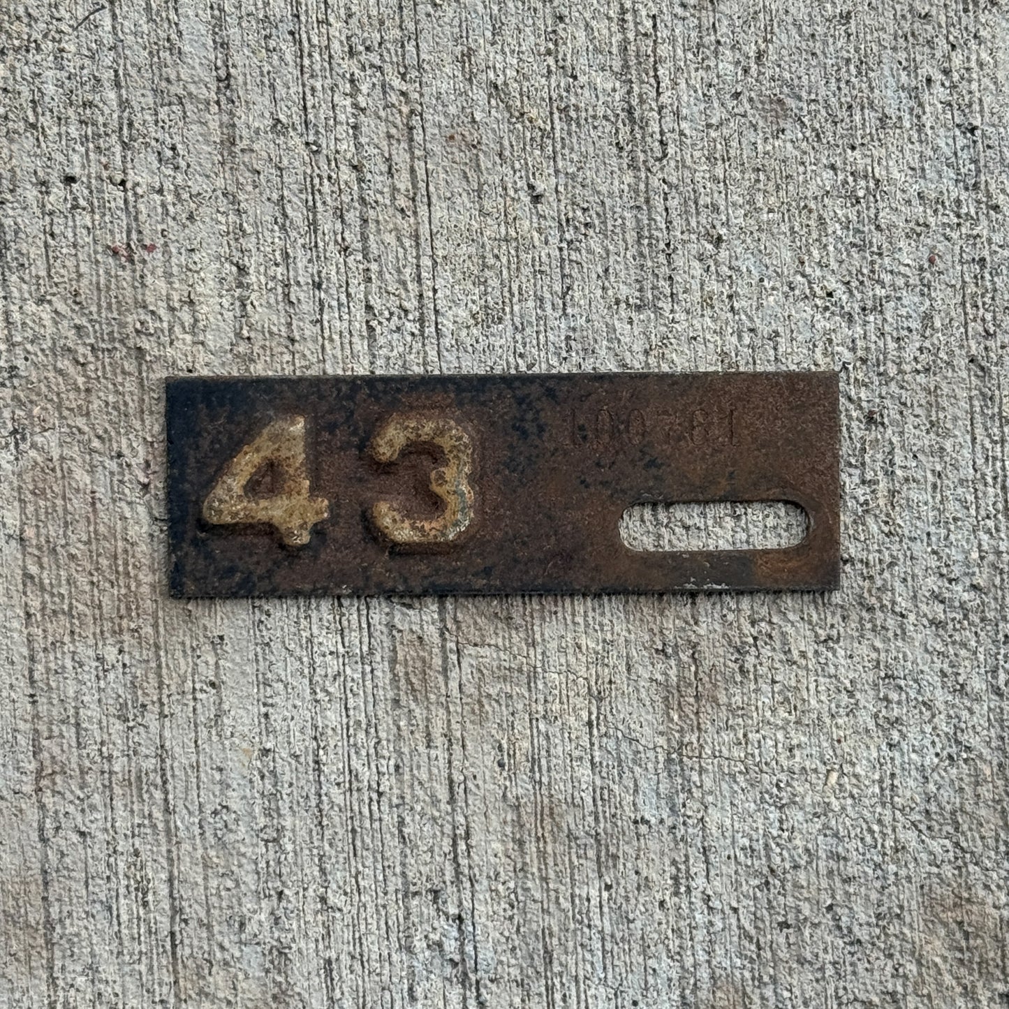 Photo of a 1943 New Jersey Tab License Plate Auto Tag 2 Vintage 100761 with original patina