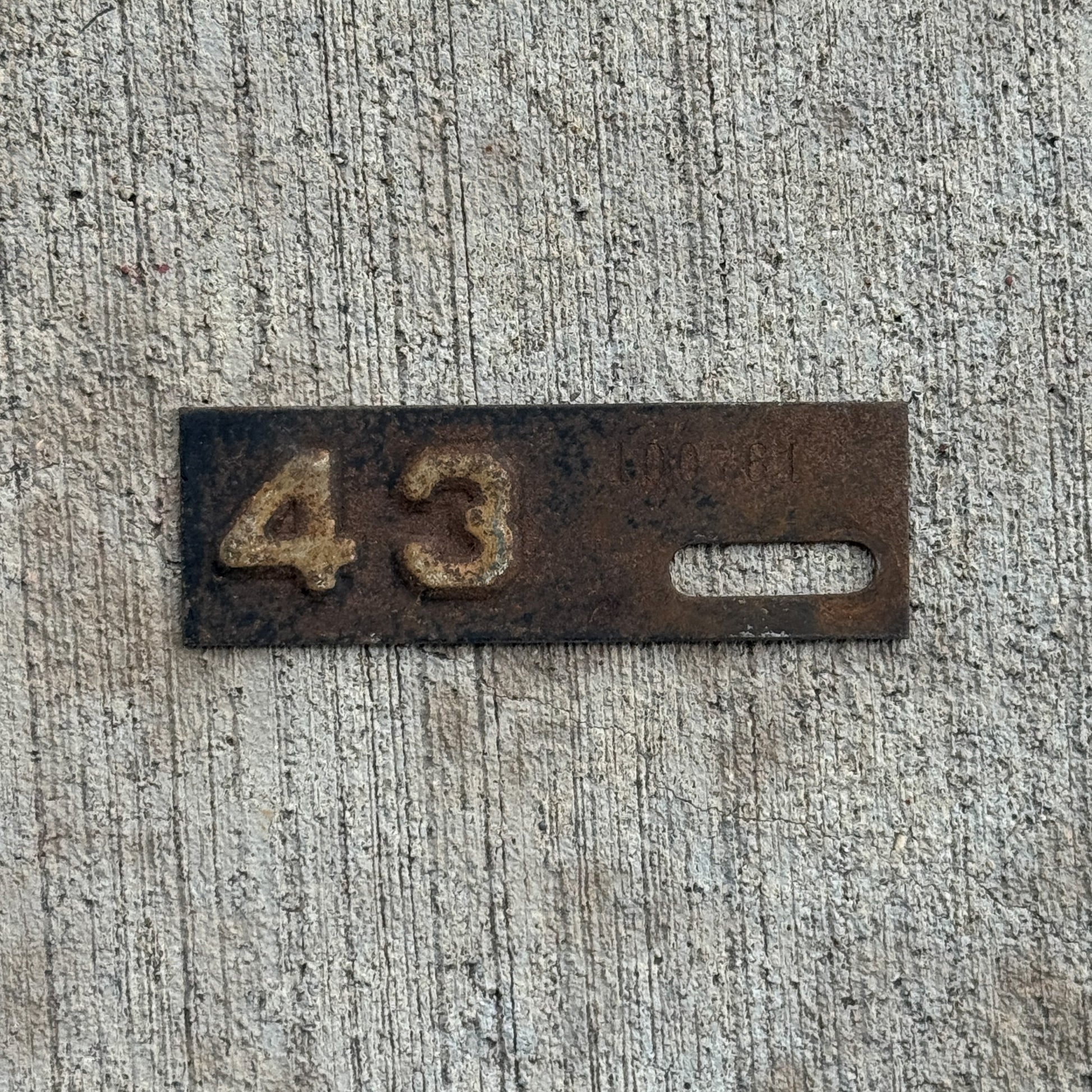 Photo of a 1943 New Jersey Tab License Plate Auto Tag 2 Vintage 100761 with original patina