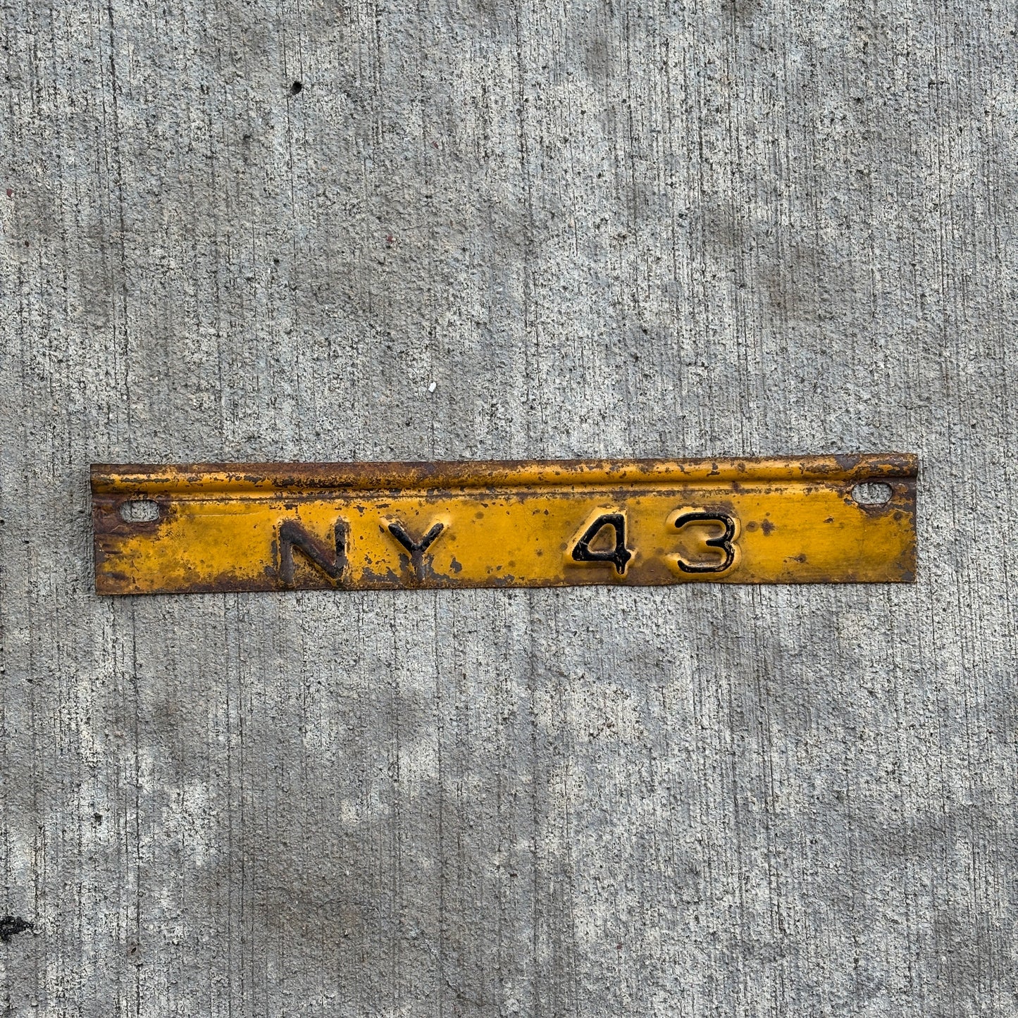Photo of a 1943 New York Tab License Plate Auto Tag Garage Decor Vintage with original patina