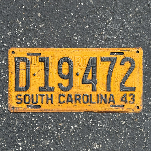 Photo of a 1943 South Carolina License Plate Auto Tag Garage Decor Vintage WW2 Restamp D 19 472 with original patina