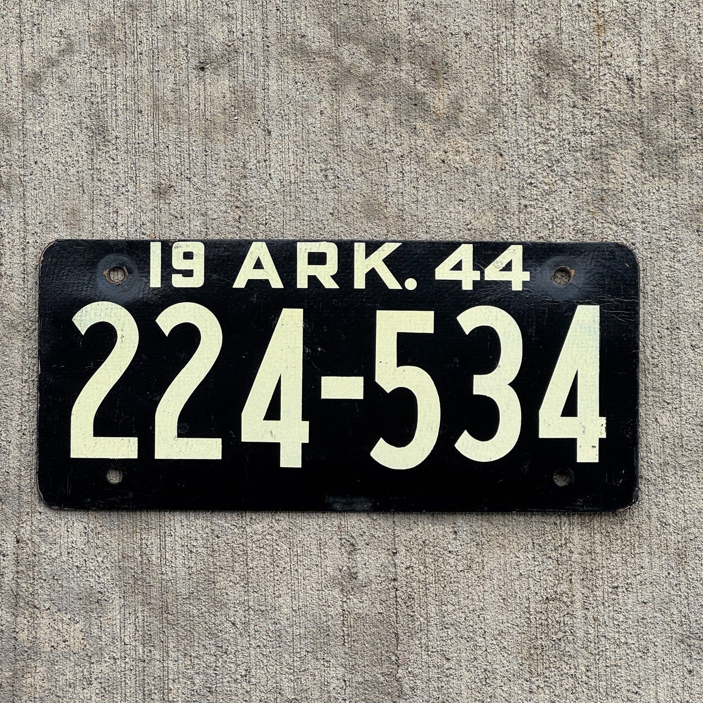 Photo of a 1944 Arkansas Fiberboard License Plate Auto Tag Garage Decor Vintage High Quality 224 534 with original patina