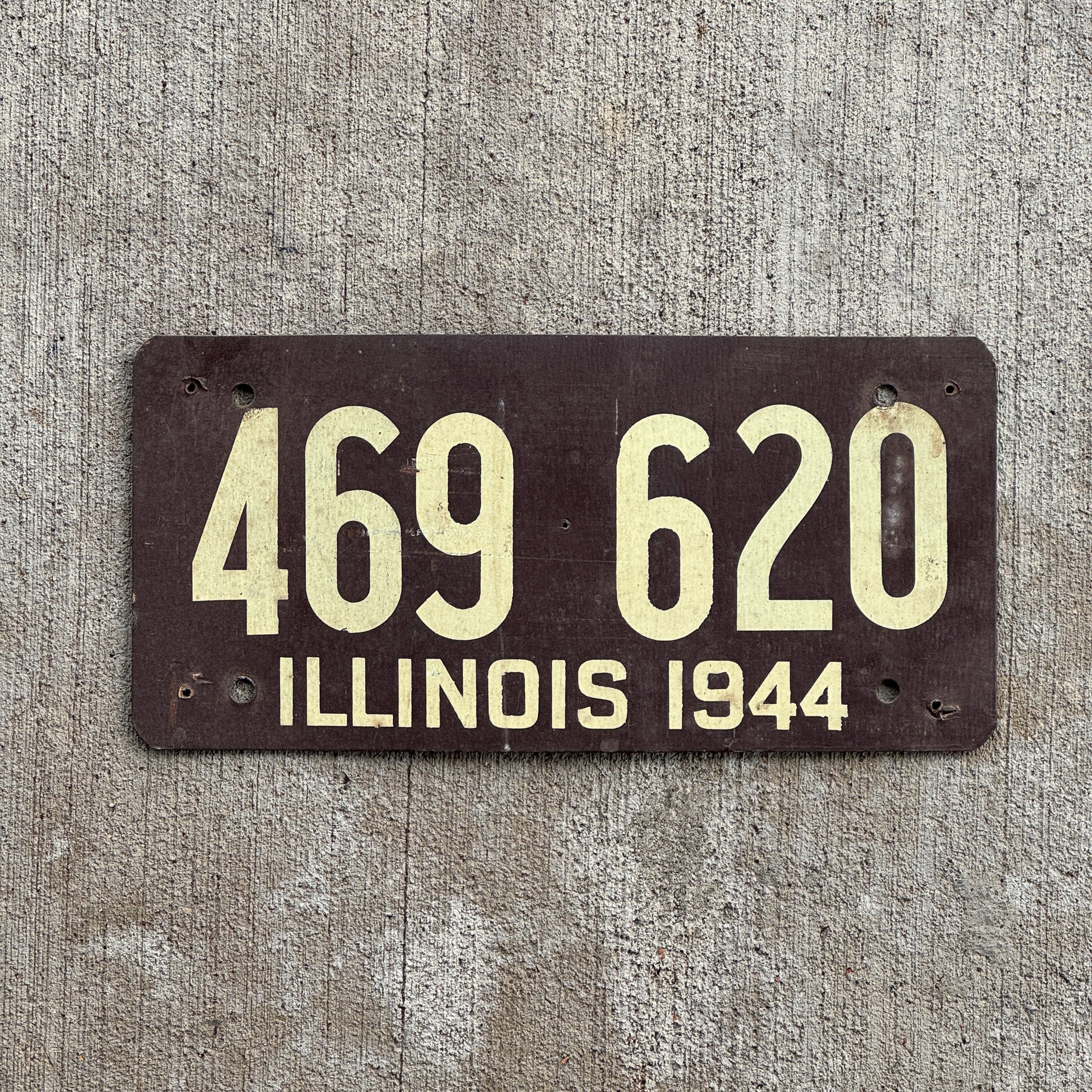 Photo of a 1944 Illinois Fiberboard License Plate Auto Tag Garage Decor Vintage 469 620 with original patina