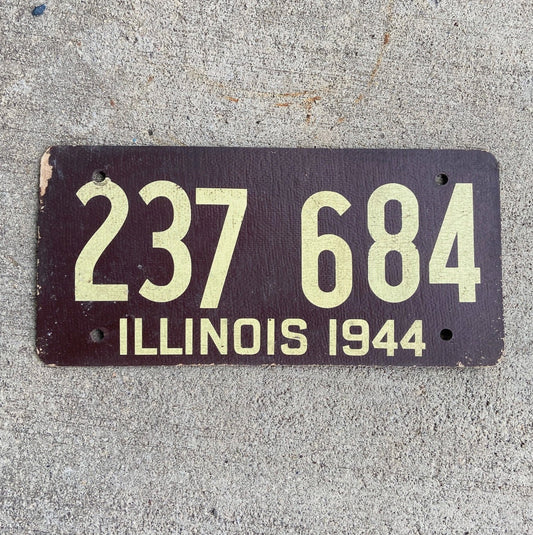 Photo of a 1944 Illinois Fiberboard License Plate Auto Tag Garage Decor Vintage WWII War Year 237 684 with original patina