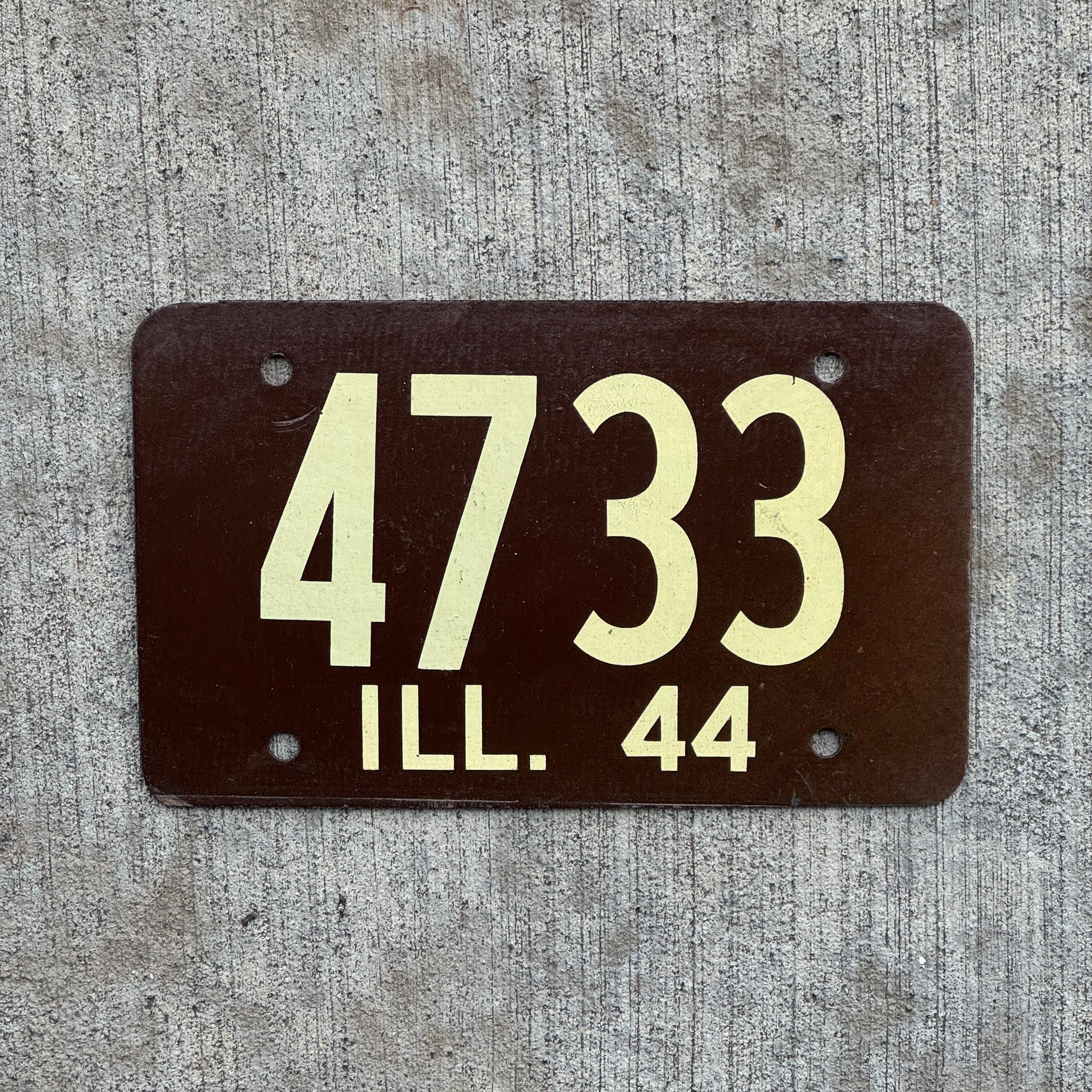 Photo of a 1944 Illinois License Plate Auto Tag Garage Decor Vintage Fiberboard Low Number Four Digit 4733 with original patina