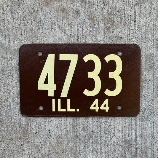 Photo of a 1944 Illinois License Plate Auto Tag Garage Decor Vintage Fiberboard Low Number Four Digit 4733 with original patina