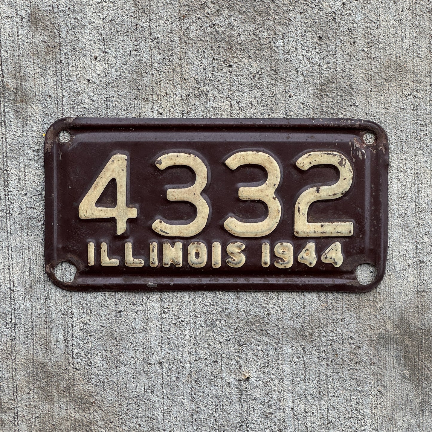 Photo of a 1944 Illinois Motorcycle License Plate Auto Tag Garage Decor Vintage Low Number Four Digit 4332 with original patina