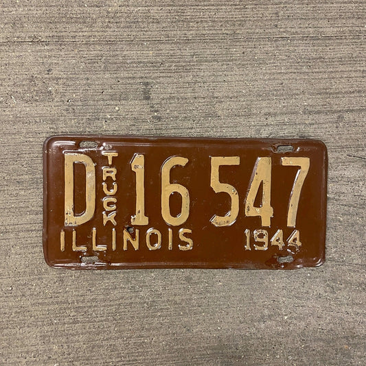 Photo of a 1944 Illinois Truck License Plate Auto Tag Garage Decor Vintage D 16547 with original patina