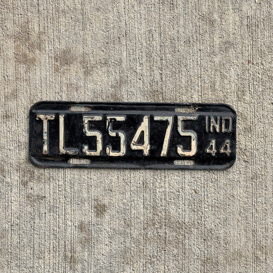 Photo of a 1944 Indiana Trailer License Plate Auto Tag Garage Decor Vintage Small War Year TL 55475 with original patina