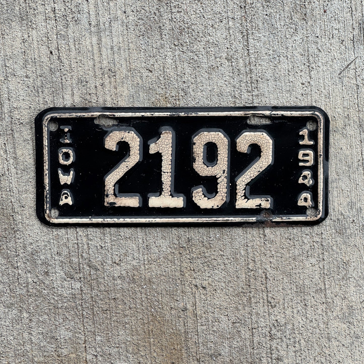 Photo of a 1944 Iowa Motorcycle License Plate Auto Tag Garage Decor Vintage ALPCA Archive Example 2192 with original patina