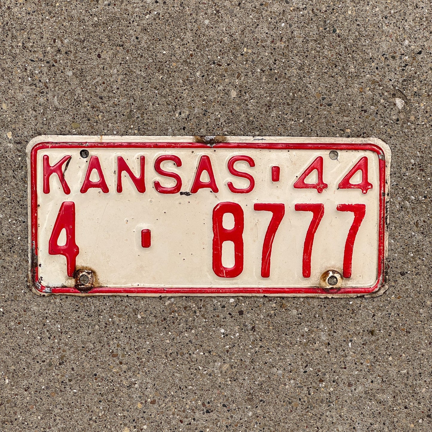 Photo of a 1944 Kansas License Plate Auto Tag Garage Decor Vintage 777 Repeat Repeating 4 8777