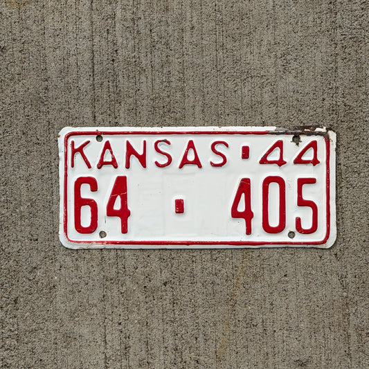 Photo of a 1944 Kansas License Plate Auto Tag Garage Decor Vintage Coffey County Three Digit 64 405 with original patina