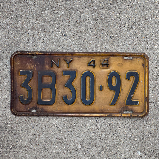 Photo of a 1944 New York License Plate Auto Tag Garage Decor Vintage Restamp WWII 3B 3092