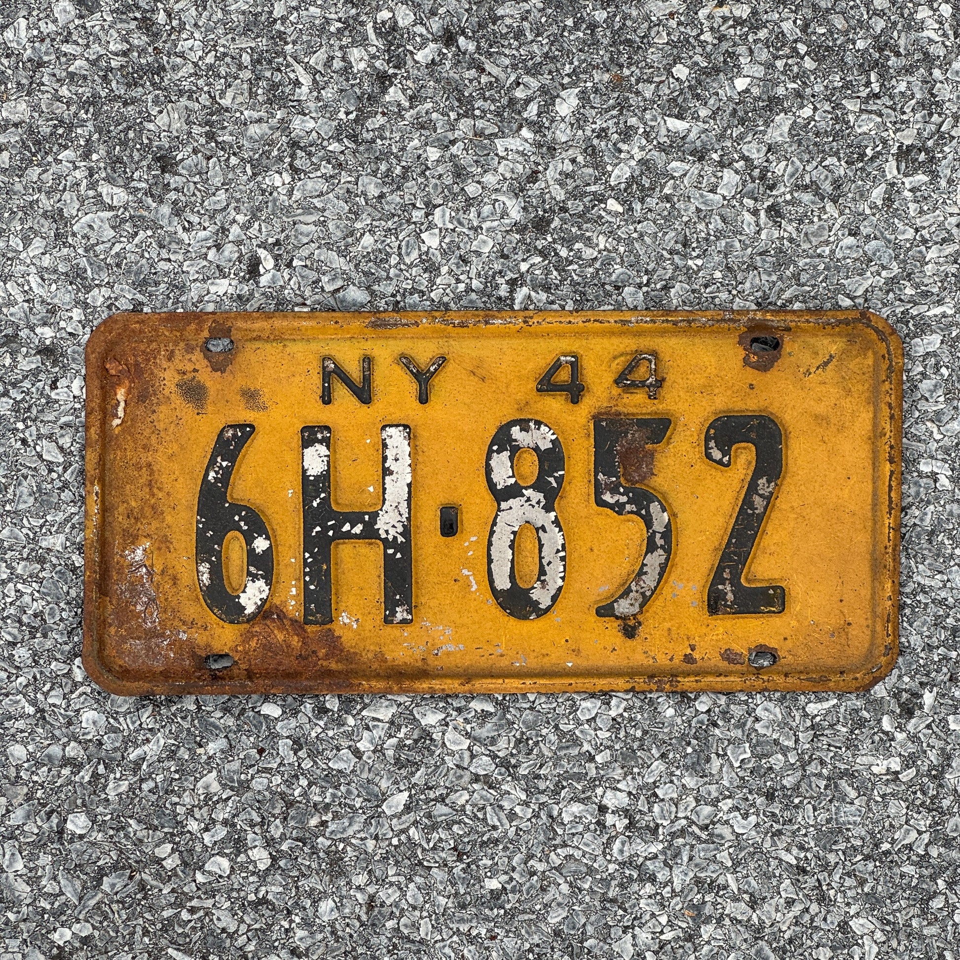 Photo of a 1944 New York License Plate Auto Tag Garage Decor Vintage Restamp WWII 6H 852