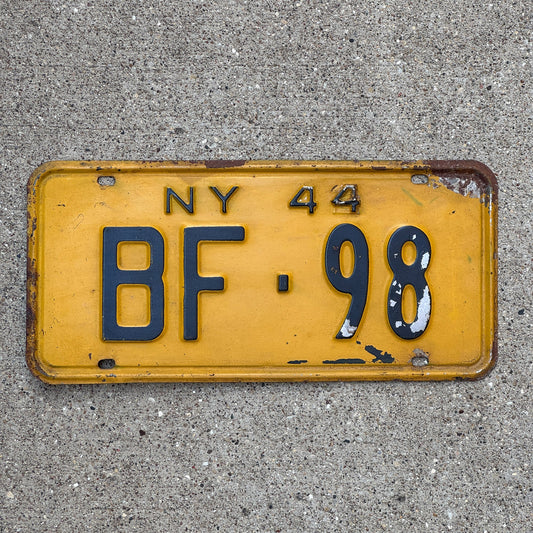 Photo of a 1944 New York License Plate Auto Tag Garage Decor Vintage Restamp WWII BF 98