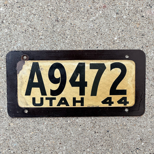 Photo of a 1944 Utah License Plate Auto Tag Garage Decor Vintage Fiberboard A 9472 with original patina