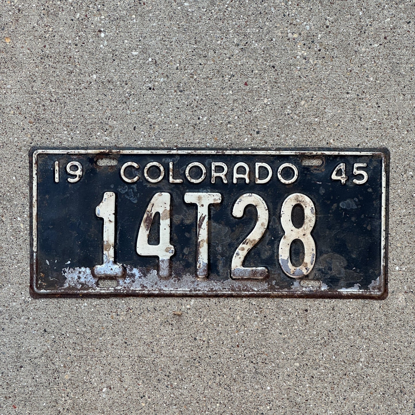 Photo of a 1945 Colorado Truck License Plate Auto Tag Garage Decor Vintage 14 T 28