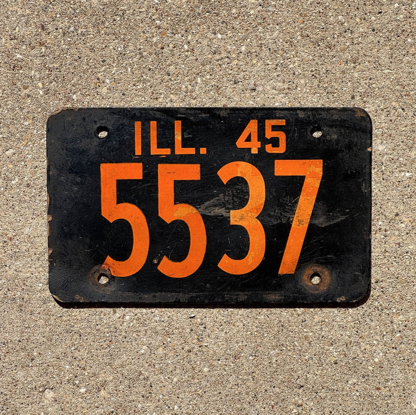 Photo of a 1945 Illinois Fiberboard License Plate Auto Tag Garage Decor Vintage 5537 with original patina