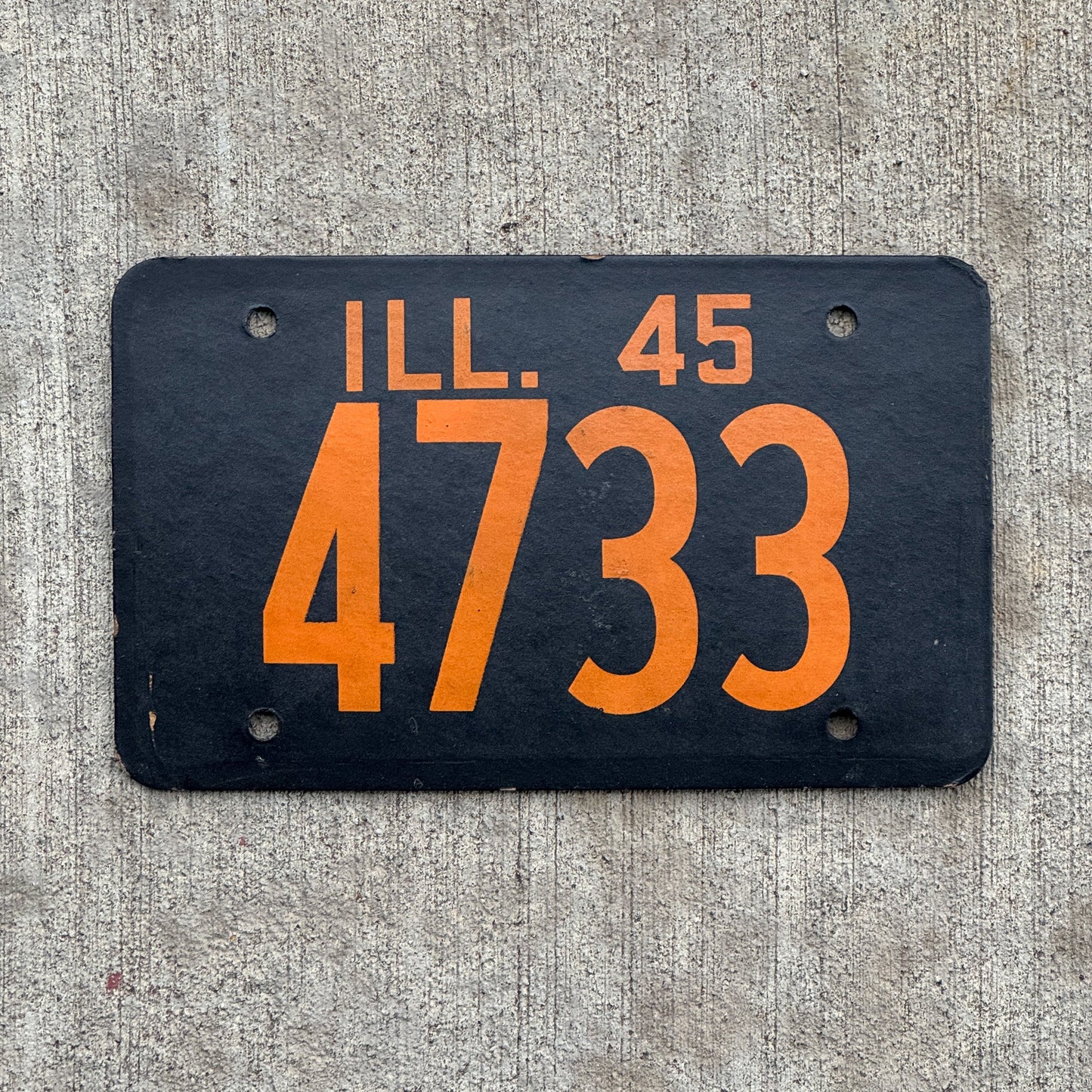 Photo of a 1945 Illinois License Plate Auto Tag Garage Decor Vintage Fiberboard Low Number Four Digit 4733 with original patina