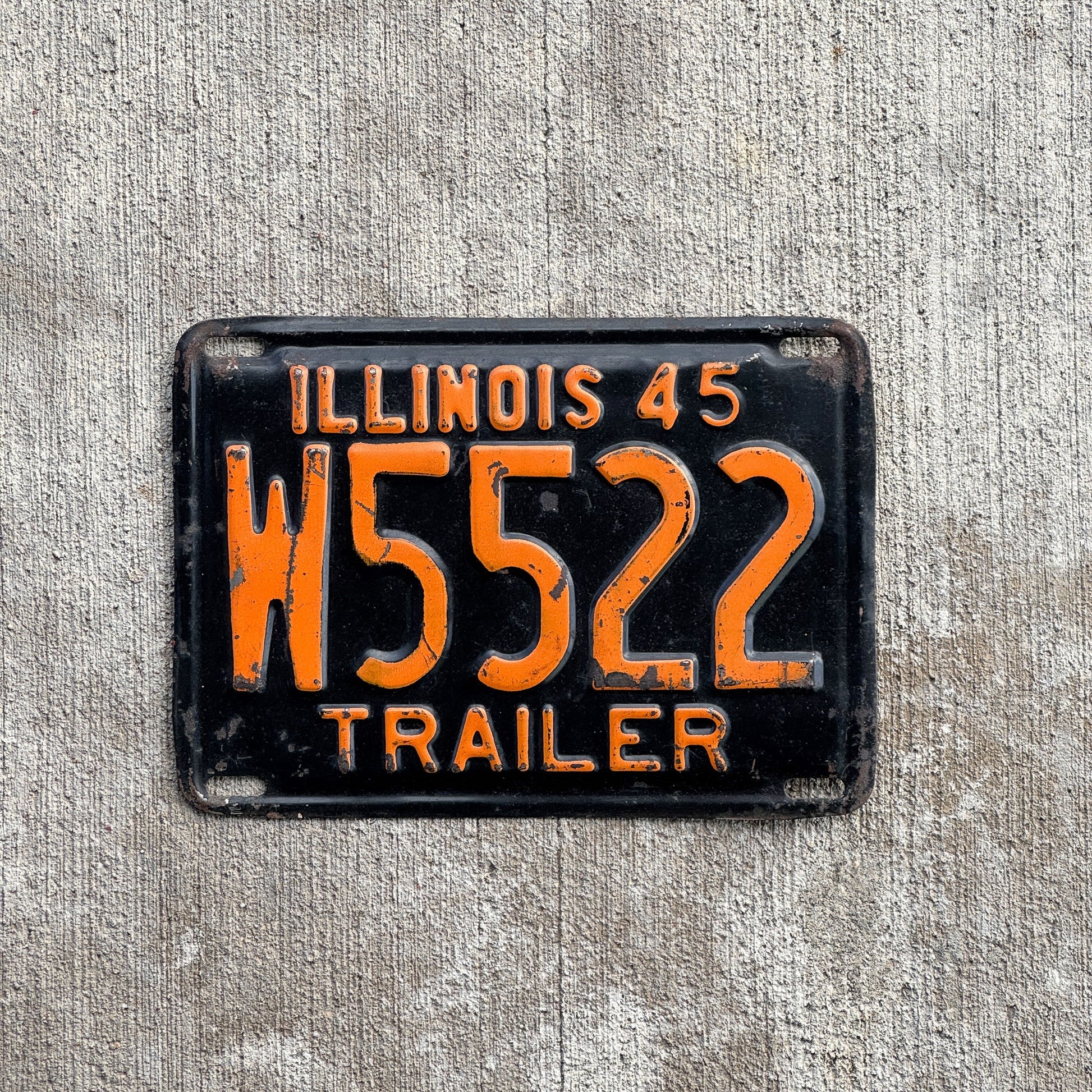 Photo of a 1945 Illinois Trailer License Plate Auto Tag Garage Decor Vintage Nice Number W 5522 with original patina