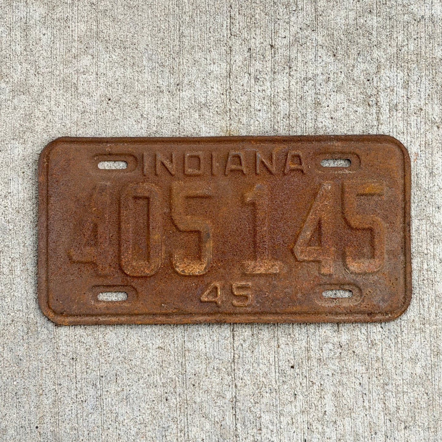 Photo of a 1945 Indiana License Plate Auto Tag Garage Decor Vintage 405 145 with original patina