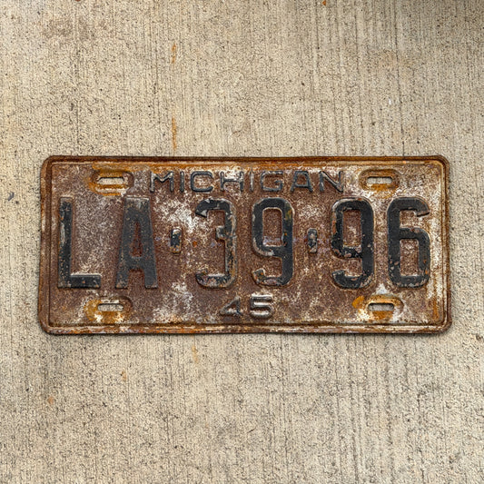 Photo of a 1945 Michigan License Plate Auto Tag Garage Decor Vintage LA 39 96 with original patina
