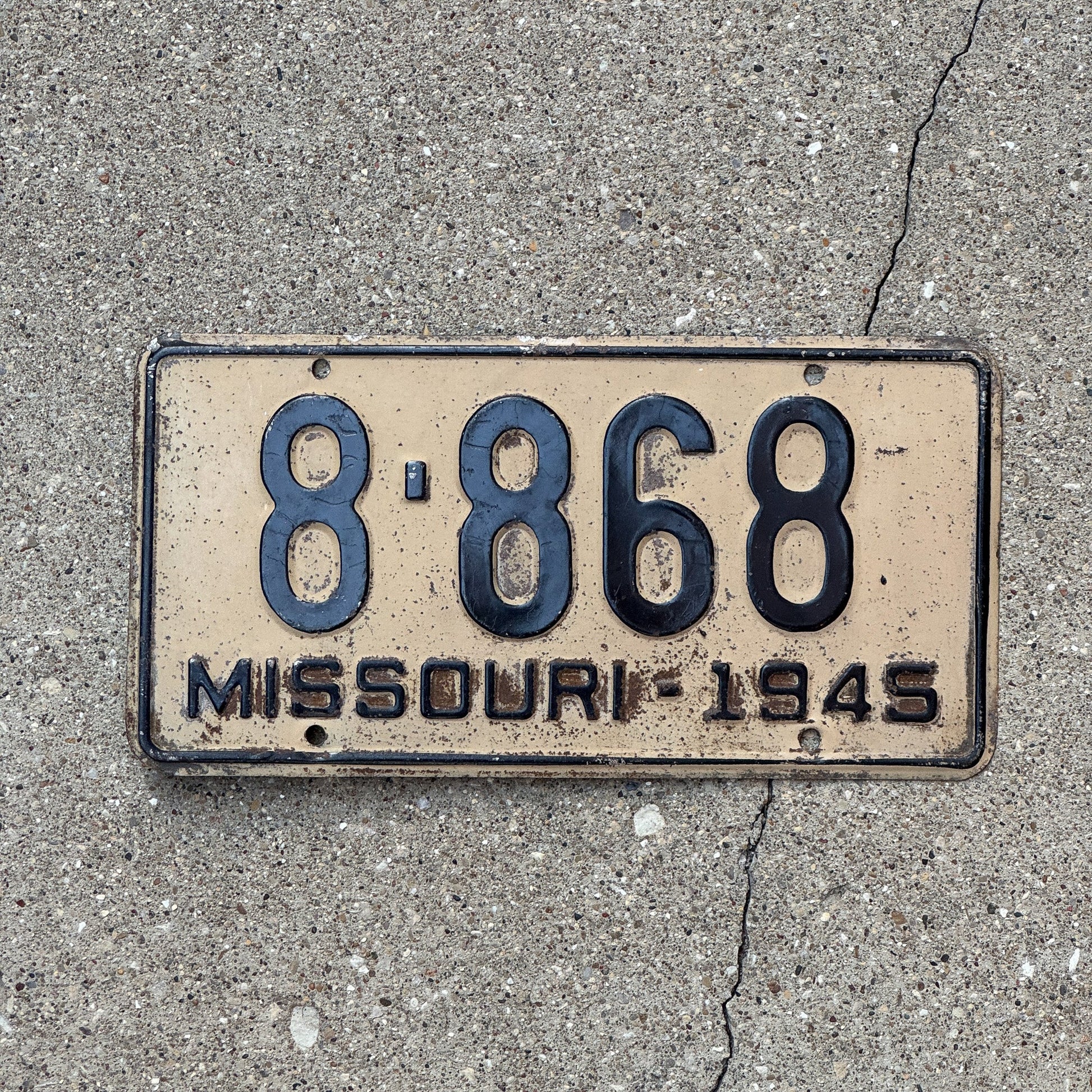 Photo of a 1945 Missouri License Plate Auto Tag Garage Decor Vintage Four Digit 8868