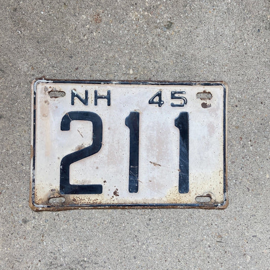 Photo of a 1945 New Hampshire License Plate Auto Tag Garage Decor Vintage Low Number Three Digit 211 with original patina