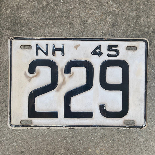Photo of a 1945 New Hampshire License Plate Auto Tag Garage Decor Vintage Low Number Three Digit 229 with original patina