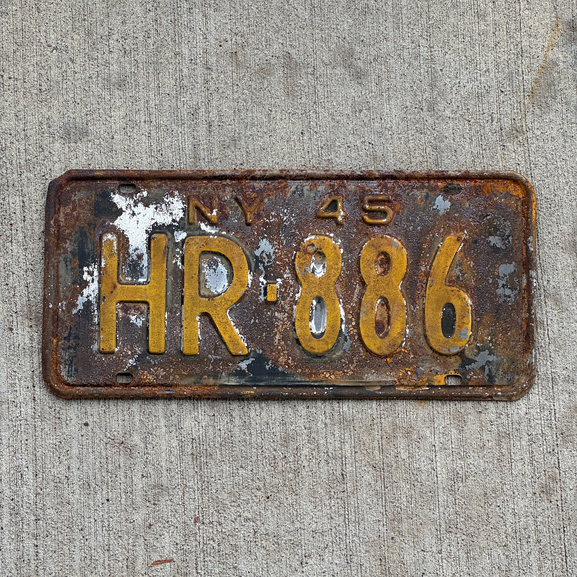 Photo of a 1945 New York License Plate Auto Tag Garage Decor Vintage HR 886 with original patina