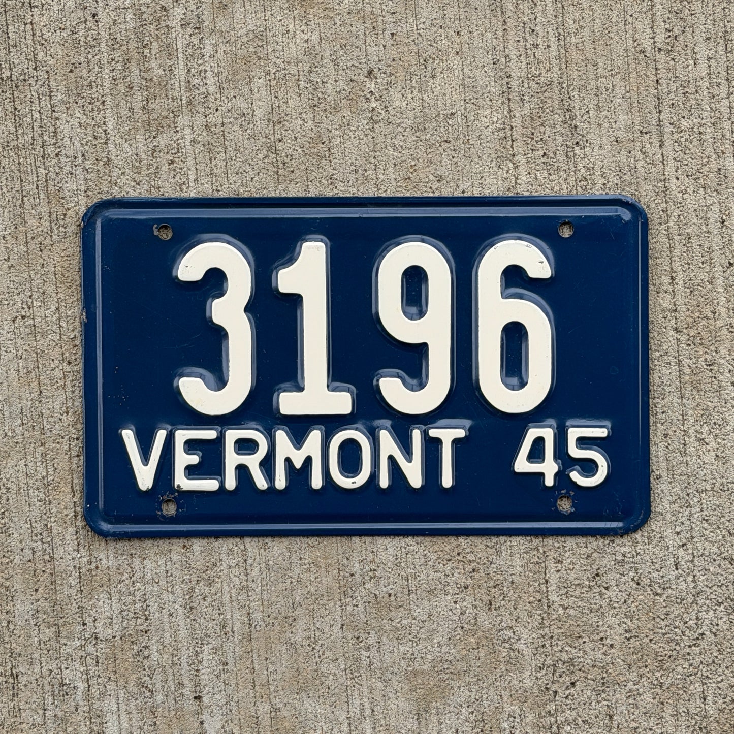 Photo of a 1945 Vermont License Plate Auto Tag Garage Decor Vintage Low Number Four Digit 3196 with original patina