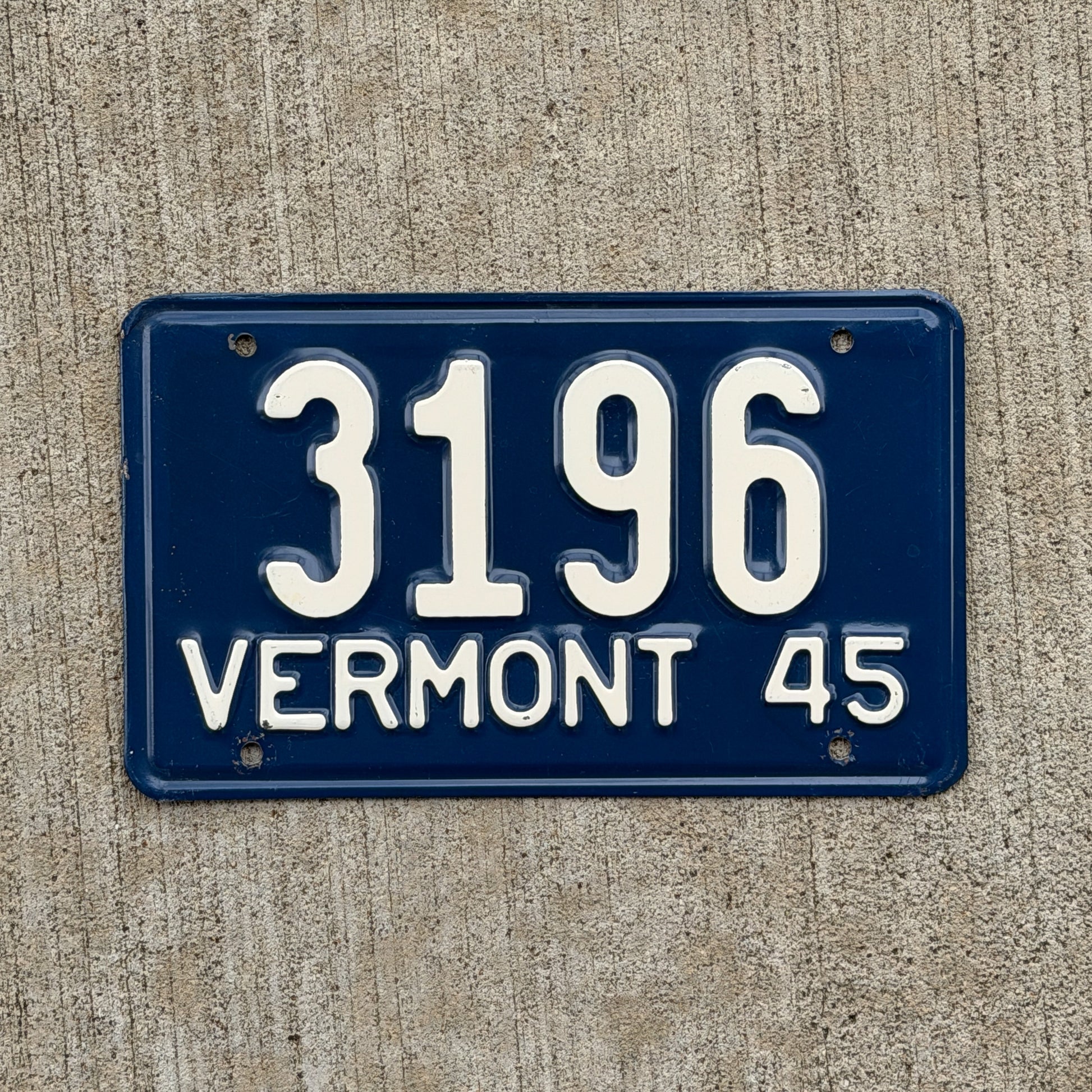 Photo of a 1945 Vermont License Plate Auto Tag Garage Decor Vintage Low Number Four Digit 3196 with original patina