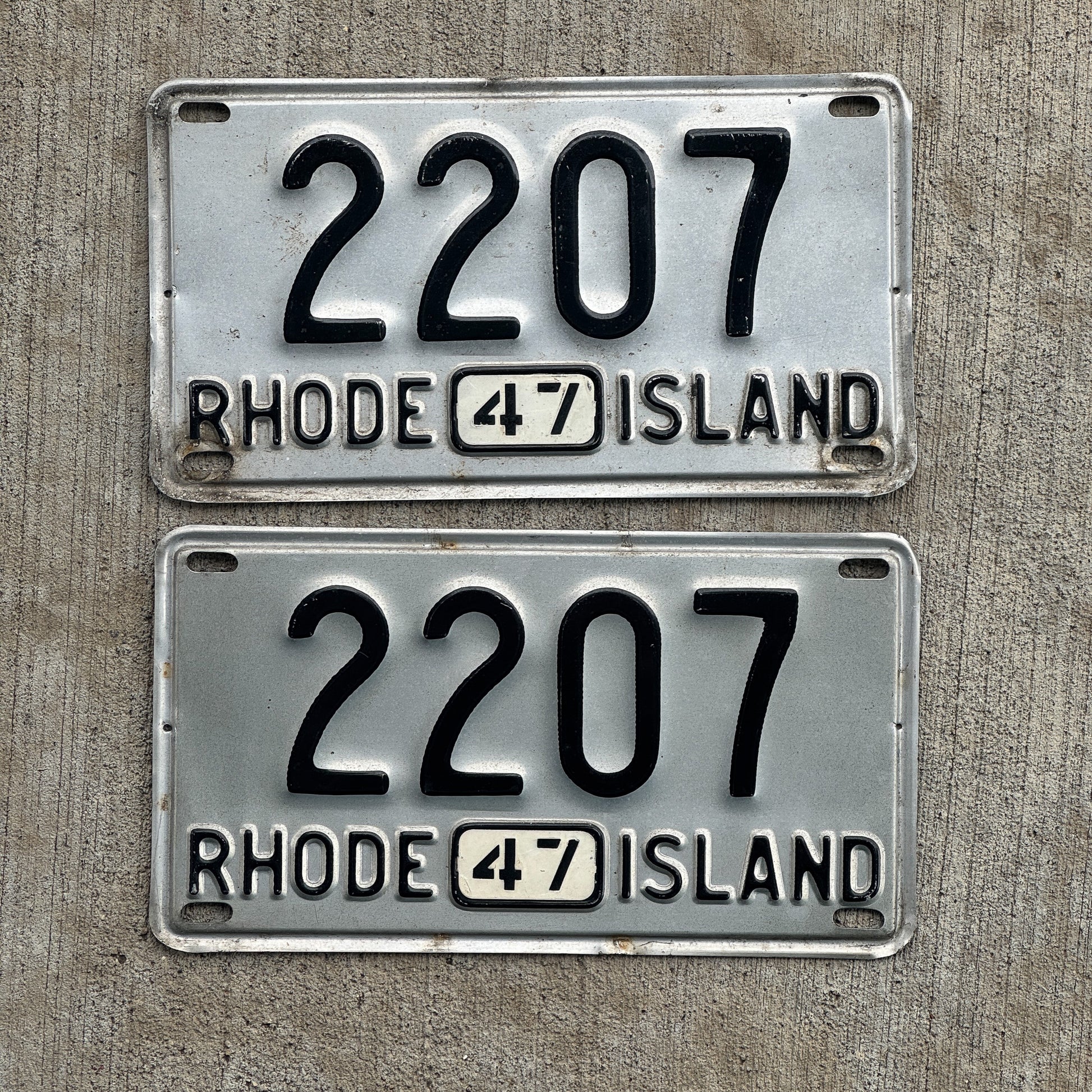 Photo of a 1946 1947 Rhode Island License Plate Pair Auto Tag Garage Decor Vintage Low Number Four Digit 2207 with original patina