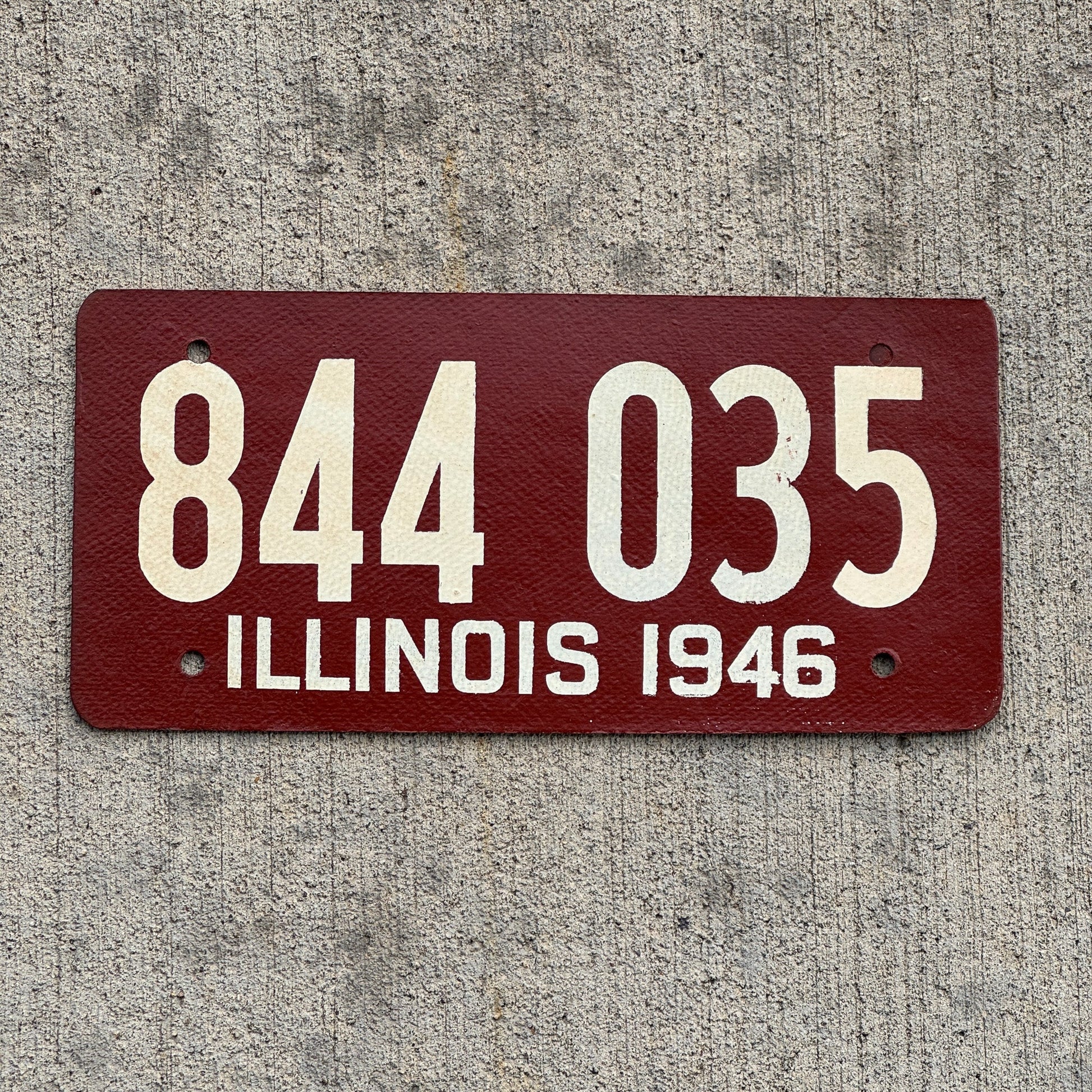 Photo of a 1946 Illinois Fiberboard License Plate Auto Tag Garage Decor Vintage High Quality 844 035 with original patina