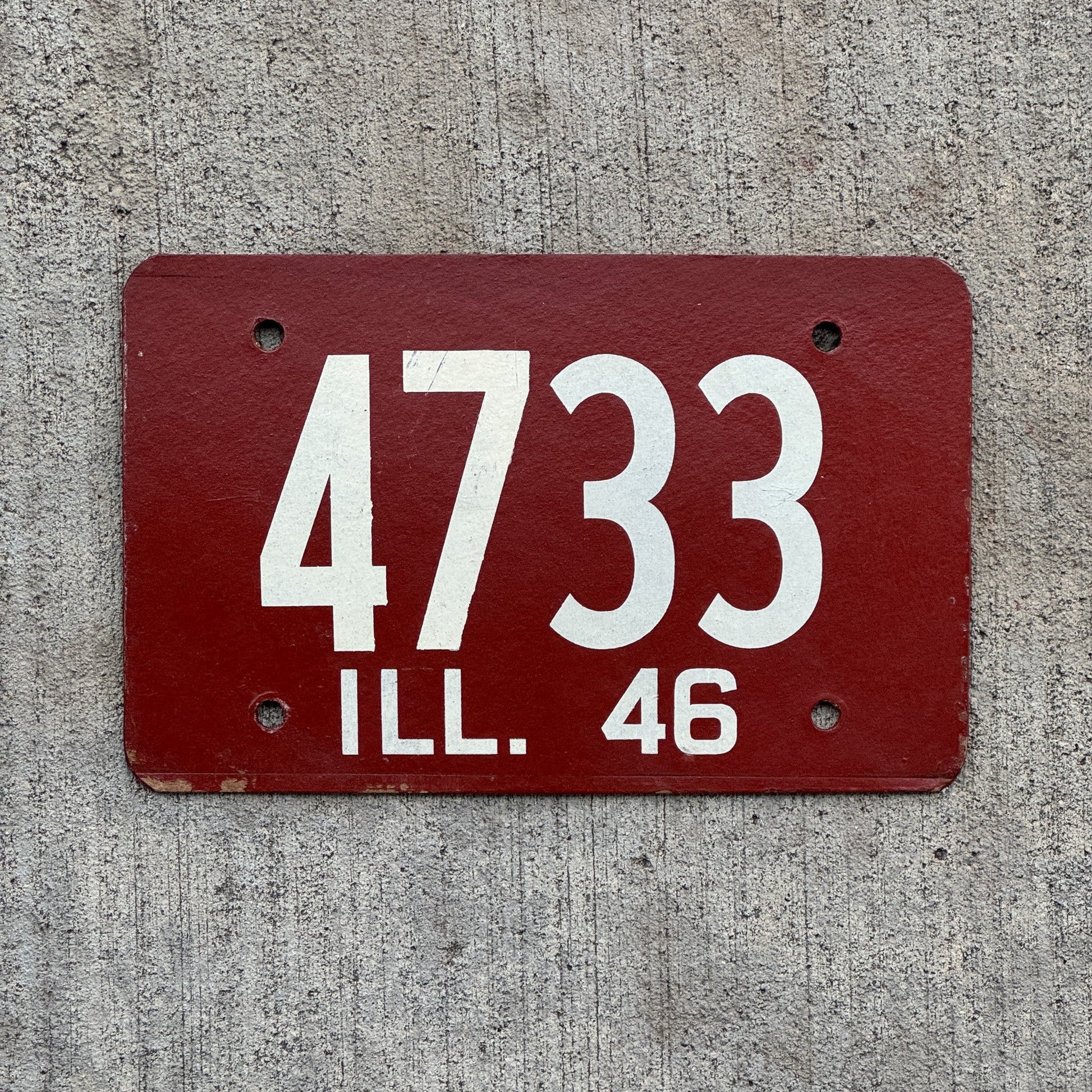 Photo of a 1946 Illinois License Plate Auto Tag Garage Decor Vintage Fiberboard Low Number Four Digit 4733 with original patina