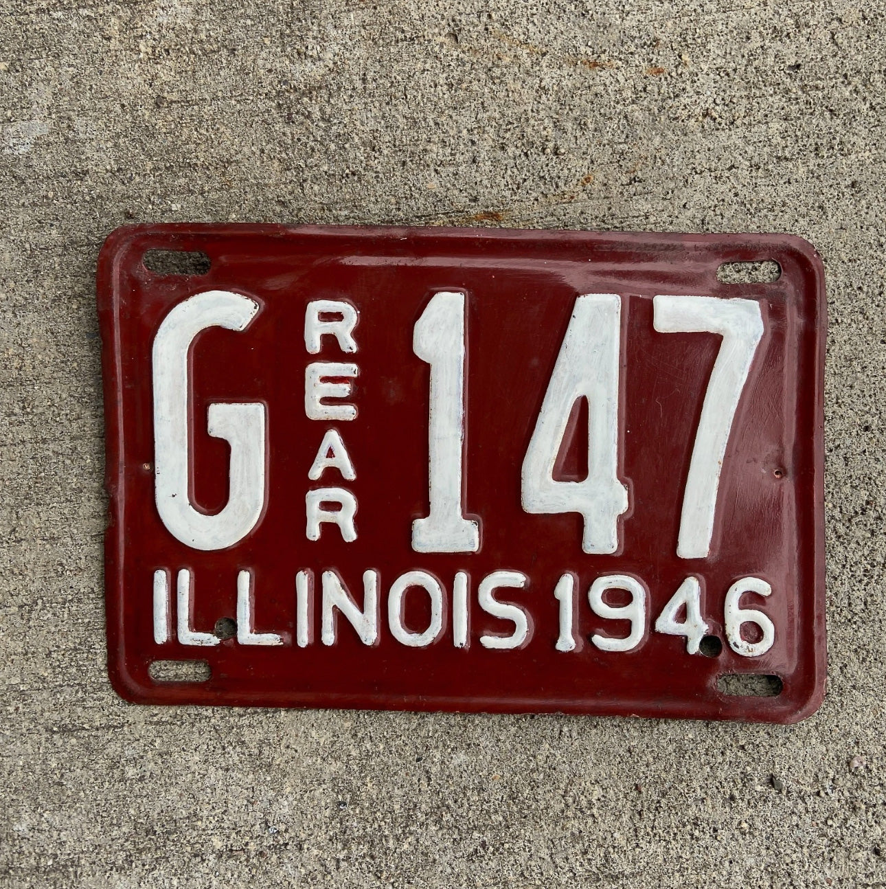Photo of a 1946 Illinois Truck License Plate Auto Tag Garage Decor Vintage Low Number Three Digit G 147 with original patina