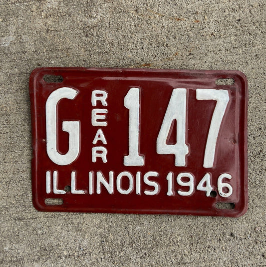 Photo of a 1946 Illinois Truck License Plate Auto Tag Garage Decor Vintage Low Number Three Digit G 147 with original patina