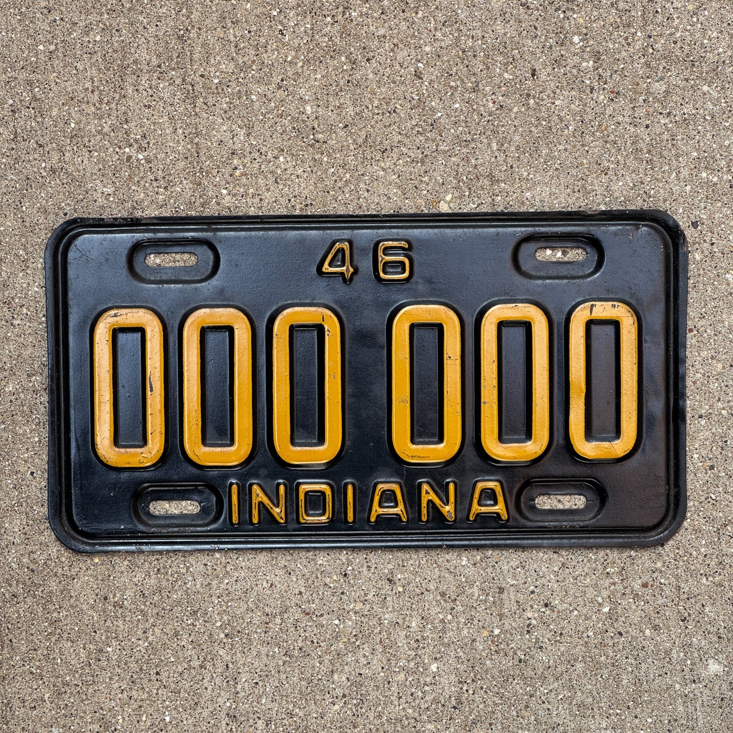Photo of a 1946 Indiana Sample License Plate Auto Tag 1 Garage Decor 000 000 with original patina
