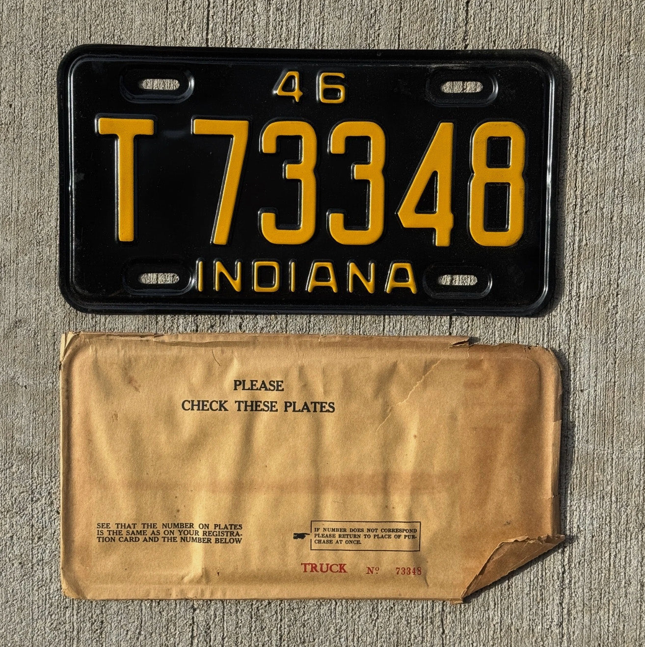 Photo of a 1946 Indiana Truck License Plate Auto Tag Garage Decor Vintage T 73348 with original patina