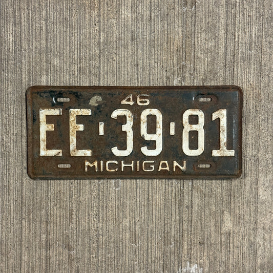 Photo of a 1946 Michigan Auto Tag Garage Decor Vintage EE 3981 with original patina
