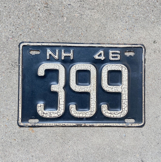 Photo of a 1946 New Hampshire License Plate Auto Tag Garage Decor Vintage Low Number Three Digit 399 with original patina