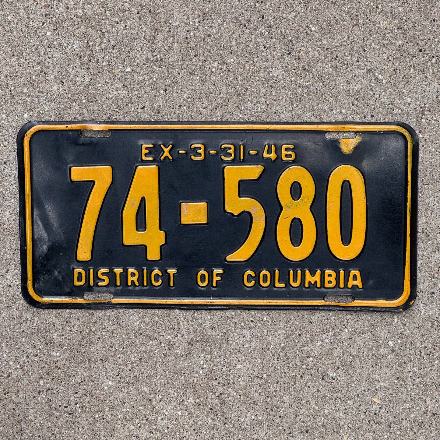Photo of a 1946 Washington DC License Plate Auto Tag Garage Decor Vintage 74 580 with original patina