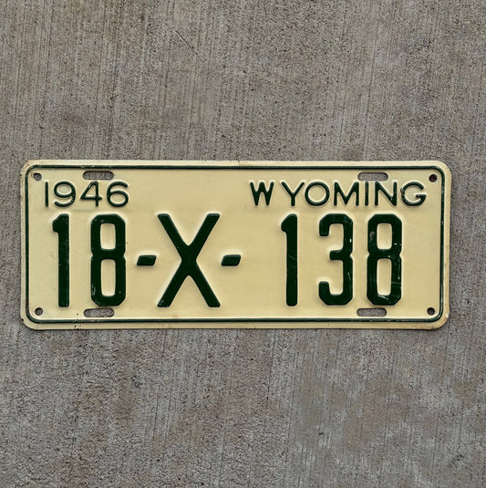 Photo of a 1946 Wyoming Trailer License Plate Auto Tag Garage Decor Vintage 18 X 138 with original patina